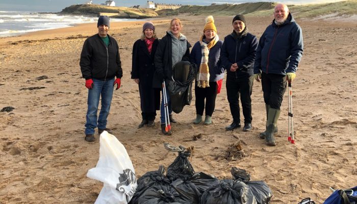 Volunteers beach cleaning at Seaton Sluice Northumberland 1000